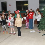Caroling at December Storytime